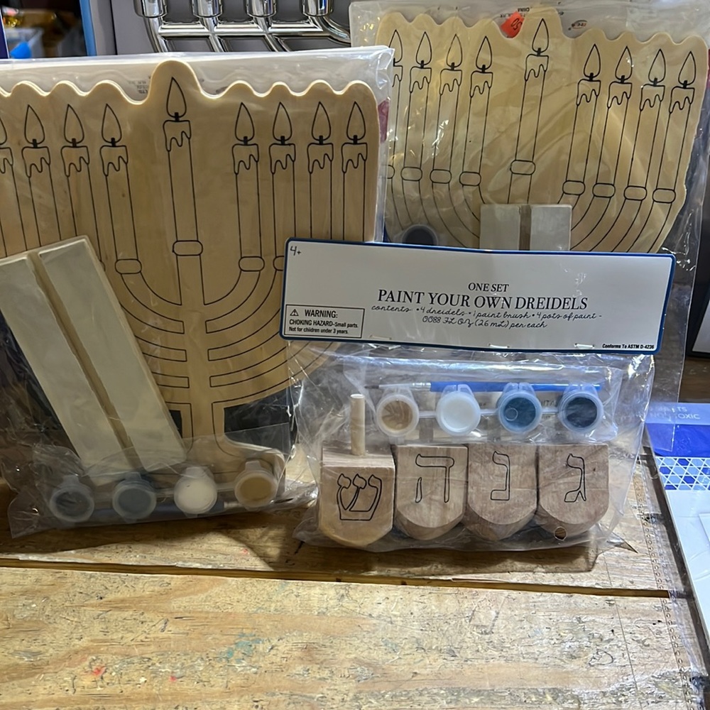 3 sets. Paint your own menorah and your own dreidels. All brand new